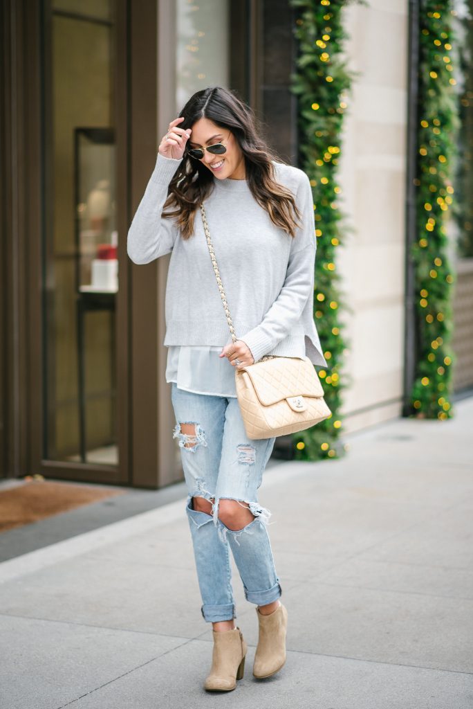 style the girl ripped boyfriend jeans and chanel single flap bag