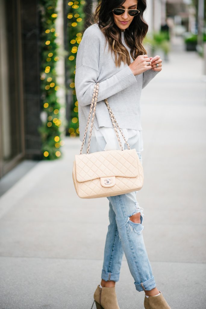 style the girl ripped boyfriend jeans and chanel single flap bag