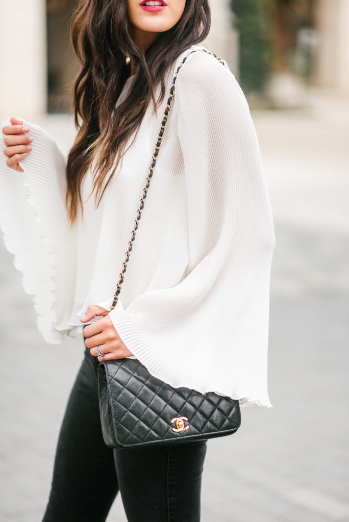 Style The Girl White Pleated Bell Sleeve Top with Black Jeans and Nude Heels